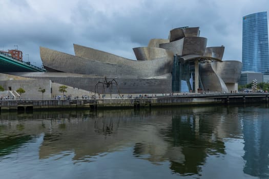 Bilbao, Spain - August 12, 2024: The Guggenheim Museum Bilbao is a museum of modern and contemporary art, designed by Canadian-American architect Frank Gehry.