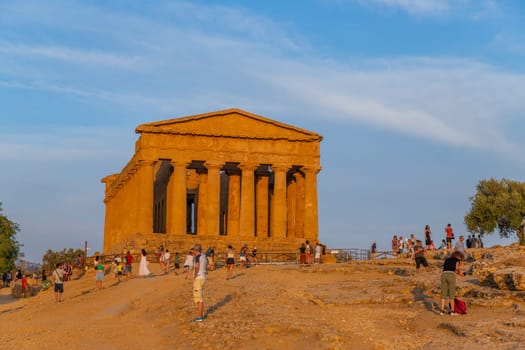 Agrigento, Italy - August 8, 2024: Tourists at Temple of Concordia in Agrigento in Sicily, Italy