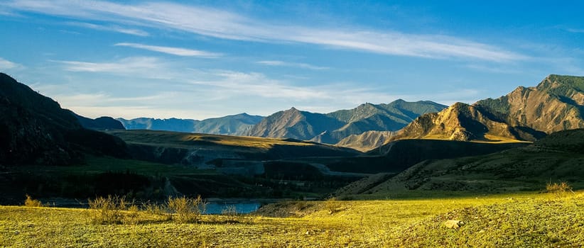 Mountains and hills altai in autumn, panoramic photo. Mountains and hills altai in autumn, panoramic photo.