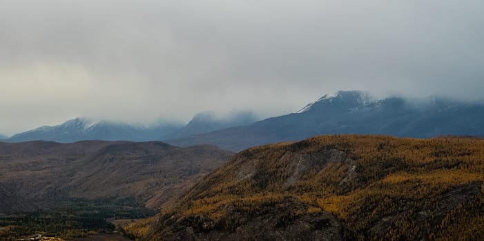 Mountains and hills altai in autumn, panoramic photo. Mountains and hills altai in autumn, panoramic photo.