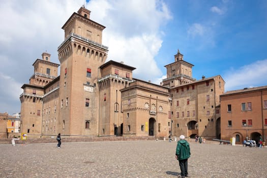 Ferrara, Italy - May 8, 2024: Castle Estense, a four towered fortress from the 14th century, Ferrara, Emilia-Romagna, Italy