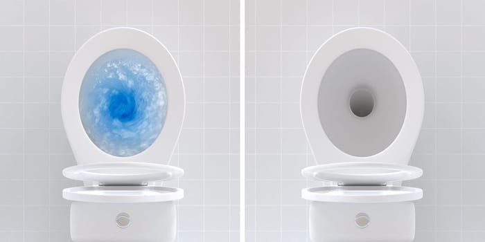 Top view of toilet bowl, blue detergent flushing in it and toilet bowl in the bathroom