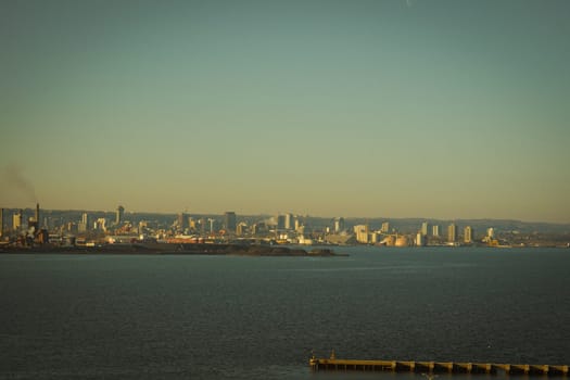 Evening view of the industrial city by the water. Shooting Location: Toronto