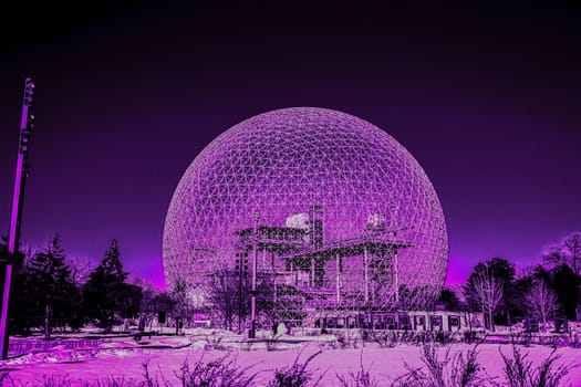 Biosphere illuminated with purple lights. Shooting Location: montreal, canada