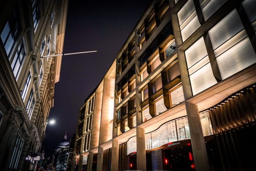 Historical buildings and people at night. Shooting Location: UK, London