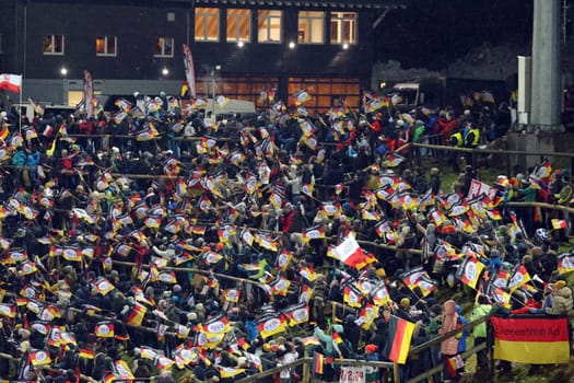 Flags,flags and a bombastic atmosphere at the FIS Ski Jumping World Cup Individual Men in Neustadt