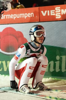 Excited look at the scoreboard: Daniel Tschofenig USV Achomitz / Aut) at the FIS Ski Jumping World Cup Individual Men in Neustadt