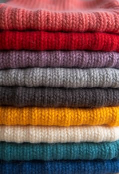 Various samples of woolen fabric in different colors are neatly organized, showcasing a vibrant palette ideal for textile design and creative projects. Generative AI.