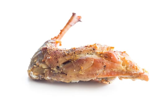 Roasted rabbit leg isolated on a white background.