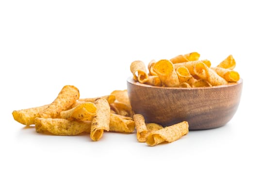 Rolled nachos tortilla chips in boowl isolated on a white background.