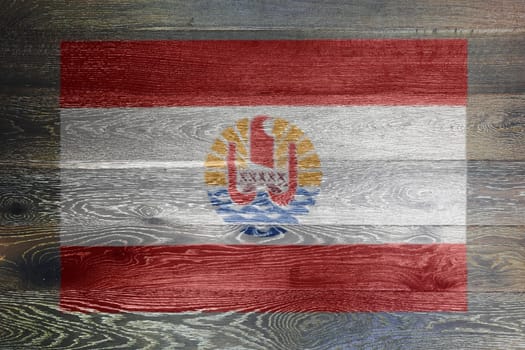 French Polynesia flag on rustic old wood surface background red white horizontal stripe