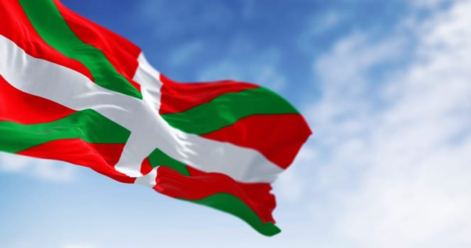 The Basque Country flag waving. Autonomous community in northern Spain. White cross over a green saltire on a red field. Selective focus. 3d illustration render. Close-up. Textured background