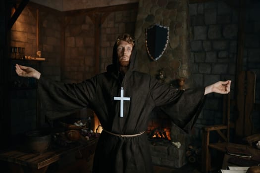 Medieval monk standing in cathedral. Religion and faith concept