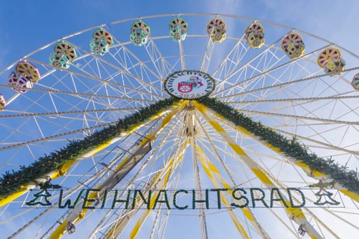 Giant ferris wheel (weihnachtsrad in german language) on the christmas market in Erfurt, Germany