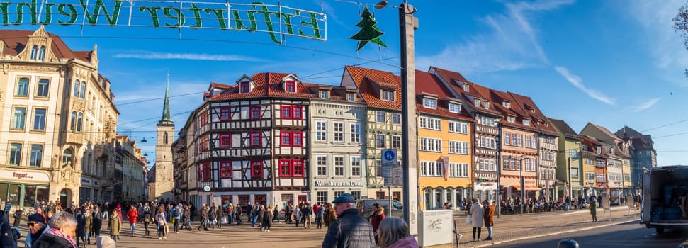 ERFURT, GERMANY - NOVEMBER 30, 2024: Lots of people visiting the annual christmas market on the Dom square