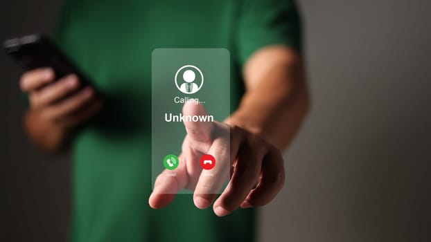 Man answering to incoming call, Phone call from unknown number, Unknown number calling in the middle of the night, Phone call from stranger, Call center gang, scammer or stranger.