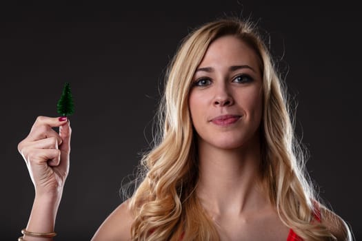 'Loving a small pine, a woman signifies her commitment to ecology, vegetation love, and sustainability. It's primary for her survival  black background