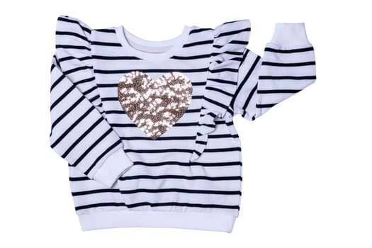 Spring and autumn children clothes. Close-up of a stylish beautiful black and white striped little girl sweater or pullover with a heart isolated. Kids winter or summer fashion.
