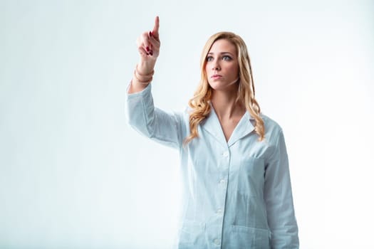 Blurred blonde in white, indicating space for floating graphic, a futuristic company's scientist or engineer
