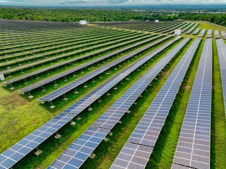 Aerial view of solar farm. Sustainable renewable energy and modern photovoltaic technology for eco-friendly electricity production. Solar power station. Green energy solutions. Solar panel technology.