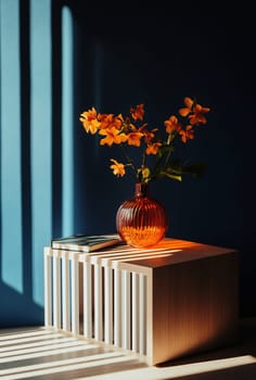 A modern table showcases a vibrant vase filled with flowers, illuminated by soft sunlight casting shadows on the wall.