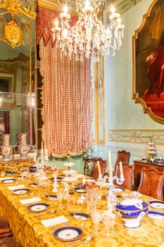 Genova, Italy - 8 August 2023: Spinola Palace. Vintage luxury dining room, elegant furniture - table and chairs