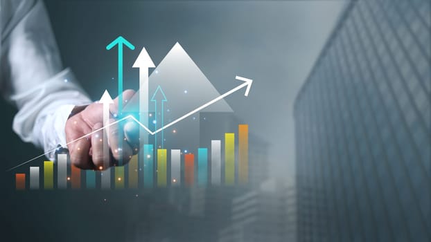Digital economic analysis technology concept, Businessman analyst invest decisions making, Human showing digital finance business data graph showing technology of investment strategy.
