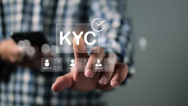 Human engaging in KYC verification, Personal information for identification, Know your customer concept, Business verifying the identity of clients for KYC financial client authentication.
