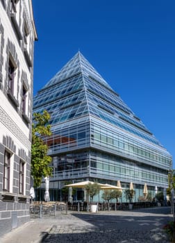 ULM, GERMANY - SEPTEMBER 20: Modern glass pyramid in Ulm, Germany on September 20, 2024.