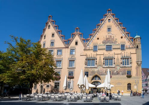 ULM, GERMANY - SEPTEMBER 20: Restaurant in front of the historic town hall of Ulm, Germany on September 20, 2024.