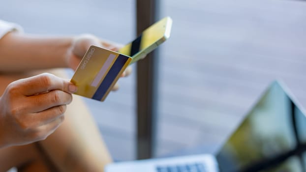 Online banking transaction concept, Woman with credit card using smart phone and shopping online, Ecommerce and secure mobile banking concept, Making online payments.