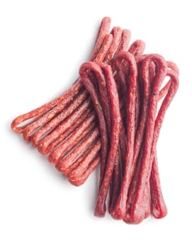 Smoked kabanos. Mini dried thin sausages isolated on a white background