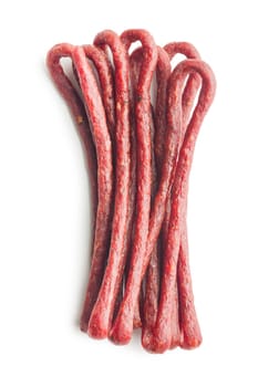 Smoked kabanos. Mini dried thin sausages isolated on a white background