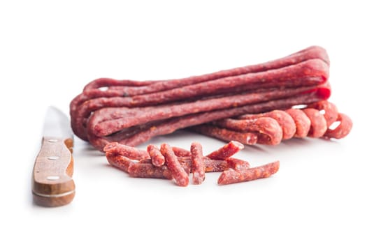 Smoked kabanos. Mini dried thin sausages isolated on a white background