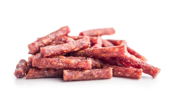 Smoked kabanos. Mini dried thin sausages isolated on a white background