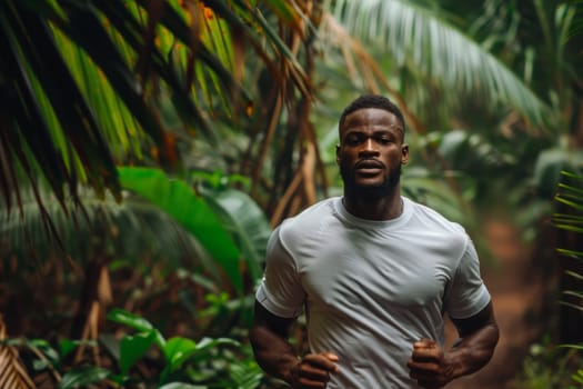 A fit, athletic man jogs through a lush, autumnal forest, surrounded by the warm, golden hues of the changing leaves