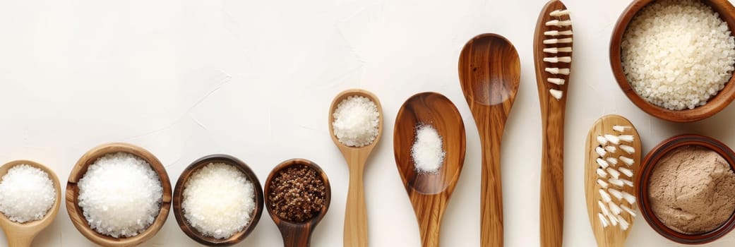 A row of wooden spoons and bowls with various spices and salt. The spoons are arranged in a line, with some closer to the front and others further back