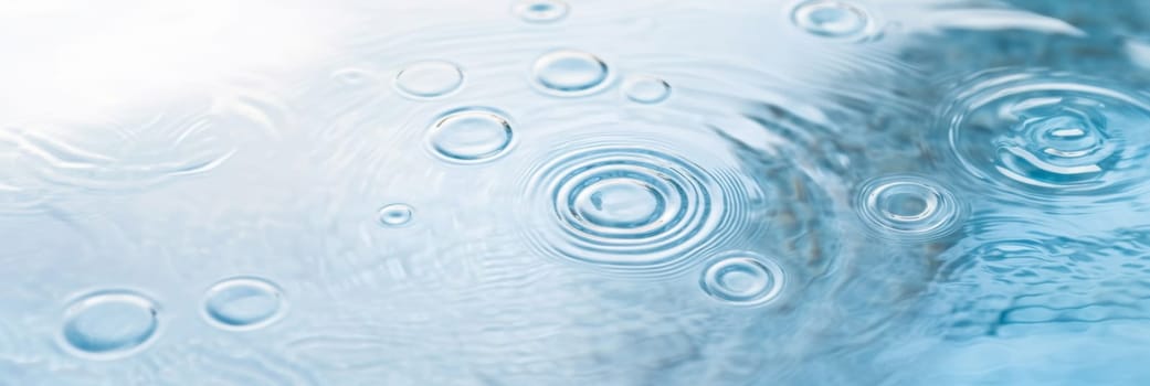 Ripples in clear blue water with abstract circular patterns, suitable as calming SPA background, AI generated
