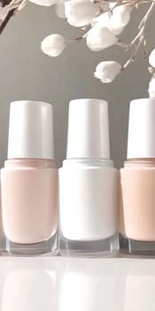 Nail polish bottles in pastel neutral shades closeup, AI generated
