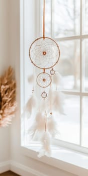 Dreamcatcher hanging in light airy room, boho decor background with copy space, AI generated
