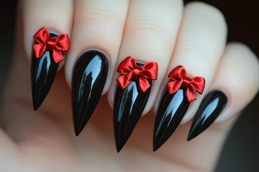 Long stiletto black nails decorated with cute small red bows