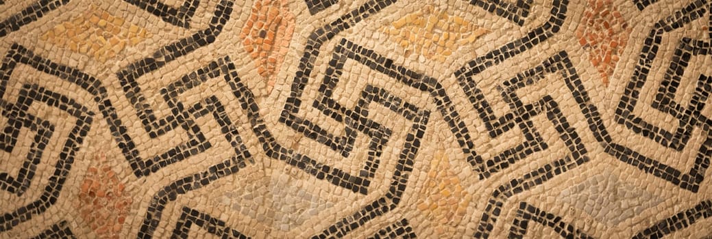 Aged swastika background. Ancient mosaic, concept of holocaust and genocide. No people.