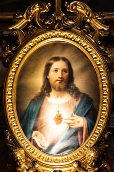 Bologna, Italy - 14 June 2024. San Luca Sanctuary. Heart of Jesus Christ painting.