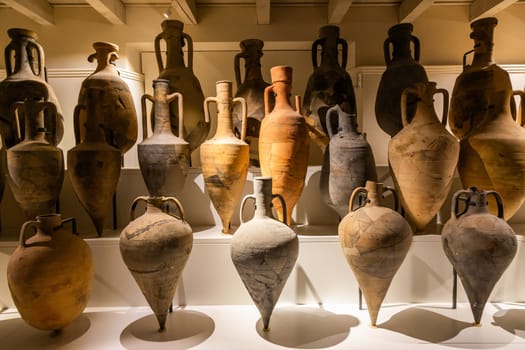 Comacchio, Italy - 11 June 2024, Delta Antique museum interior. Mediterranean amphoras. Italic and Greek wine and oil container.