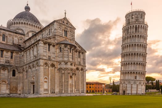 Pisa, Italy - 29 June 2023: cathedral sightseeing, travel destination, sunrise light, famous artistic building