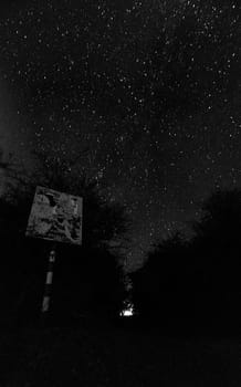 Starry sky over the mountains. A view of the night sky in autumn.