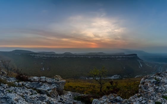 Mountains and forests of Crimea. coniferous and deciduous trees on the hills of the mountains and rocks