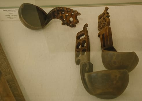 Wooden utensils, museum of Russian culture. Ancient Russian utensils.