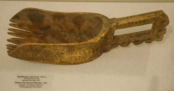 Moscow, Russia - May 24, 2019: Wooden utensils, museum of Russian culture. Ancient Russian utensils.