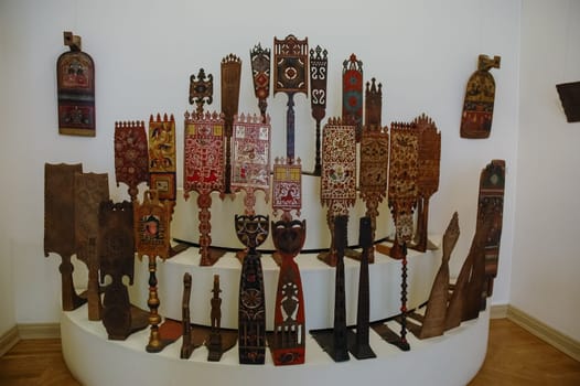 Wood carvings, spinning with folk Russian ornaments.